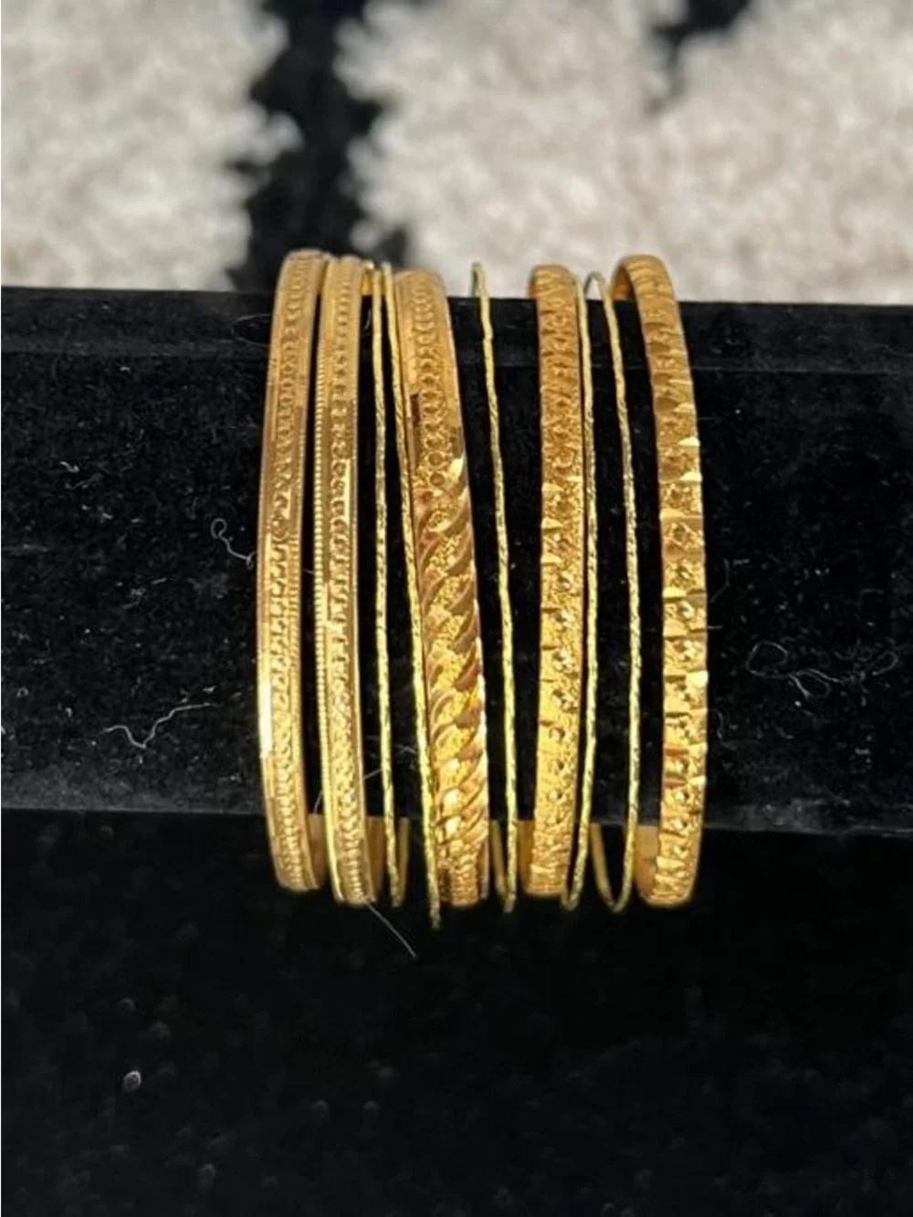 Dainty daintiest Gold tone bangles with textured, finish